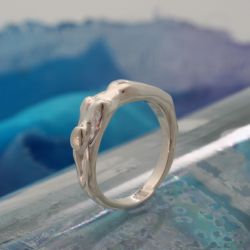 Vrouwelijk naakt als ring