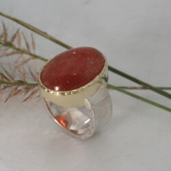 Goud en zilveren ring met zonnesteen