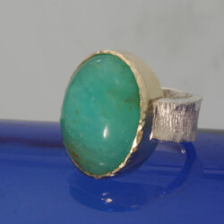 Goud en zilveren ring met andesopaal